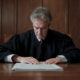 judge examining documents 80x80